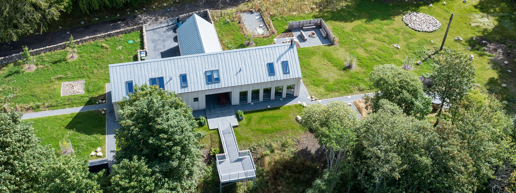 Larch House Glenshee luxury self catering viewed from above in the cairngorms countryside, scotland